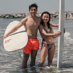 Surfers Lucas Tay and Irene Ryu.